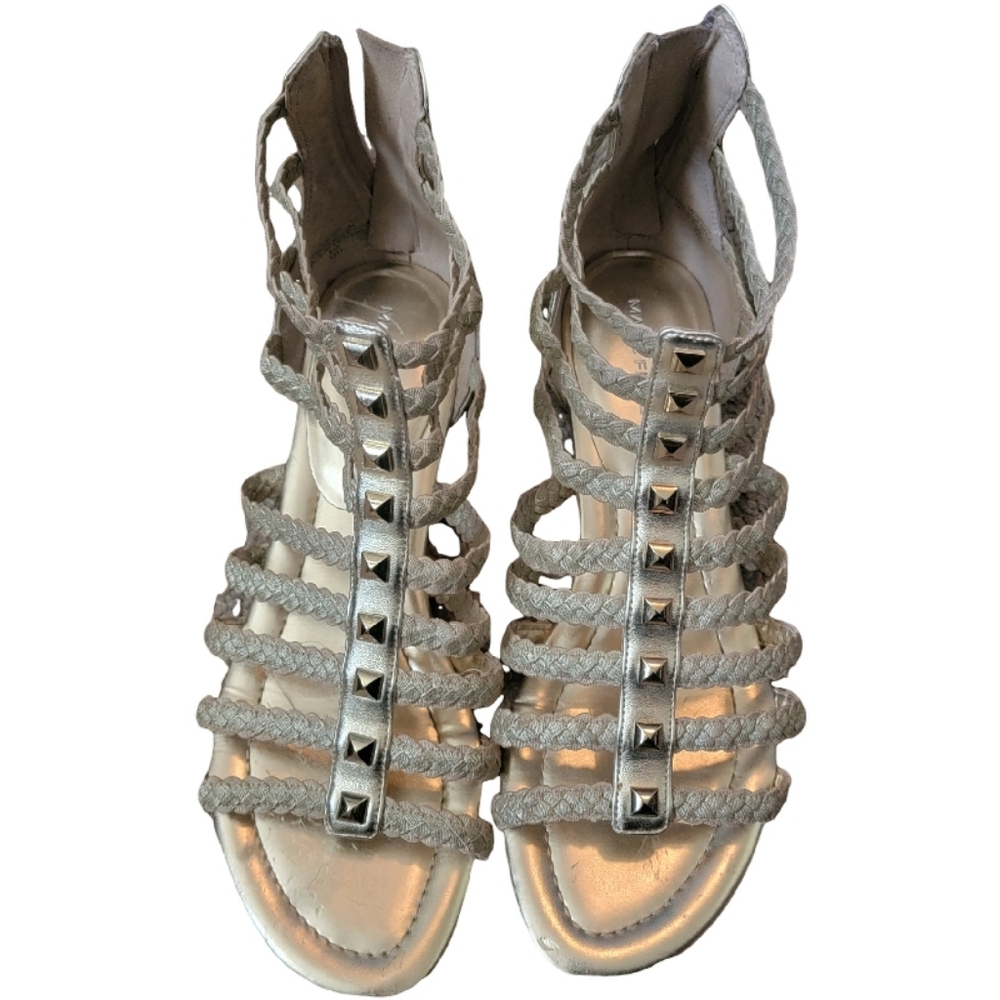 Gold gladiator sandals.